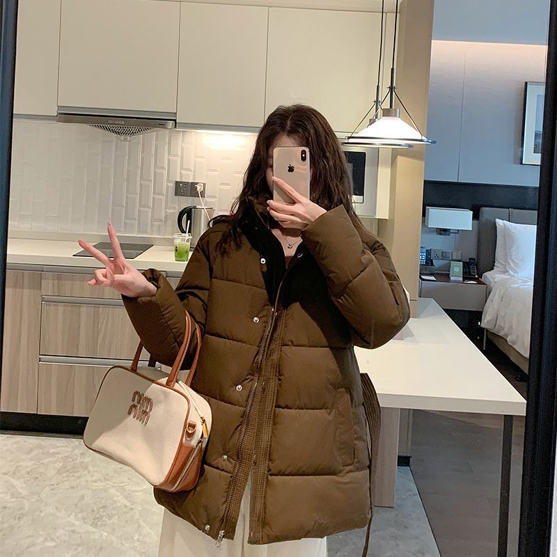 Damen gesteppte Winterjacke mit hohem Kragen und seitlichen Taschen