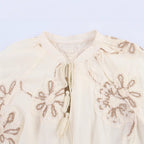 Damen Bluse mit floralem Stickmuster und eleganten Quasten R&B