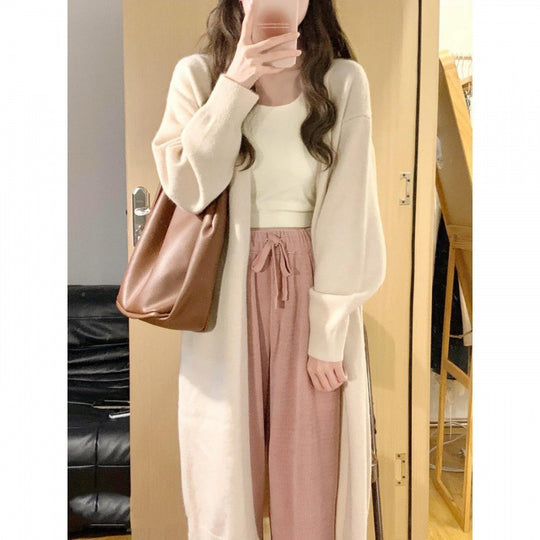 Damen Gemütliche Strickjacke mit oversized Schnitt und sanften Puffärmeln R&B