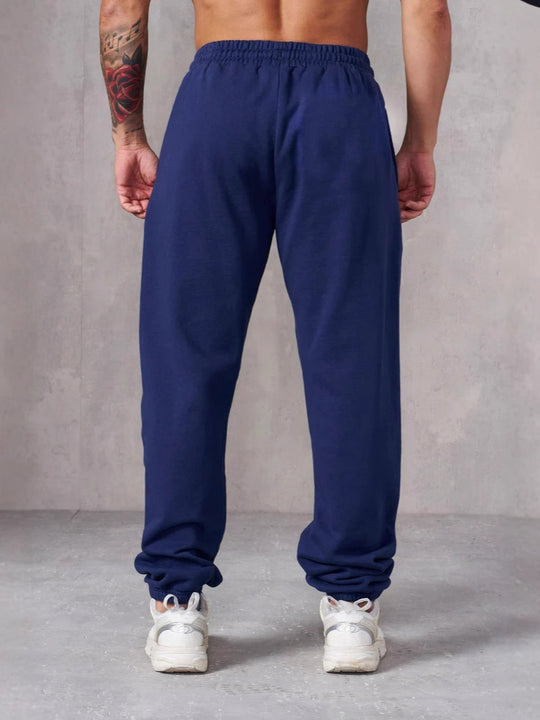 Herren Baggy Jogginghose mit elastischem Bund und seitlichen Taschen R&B