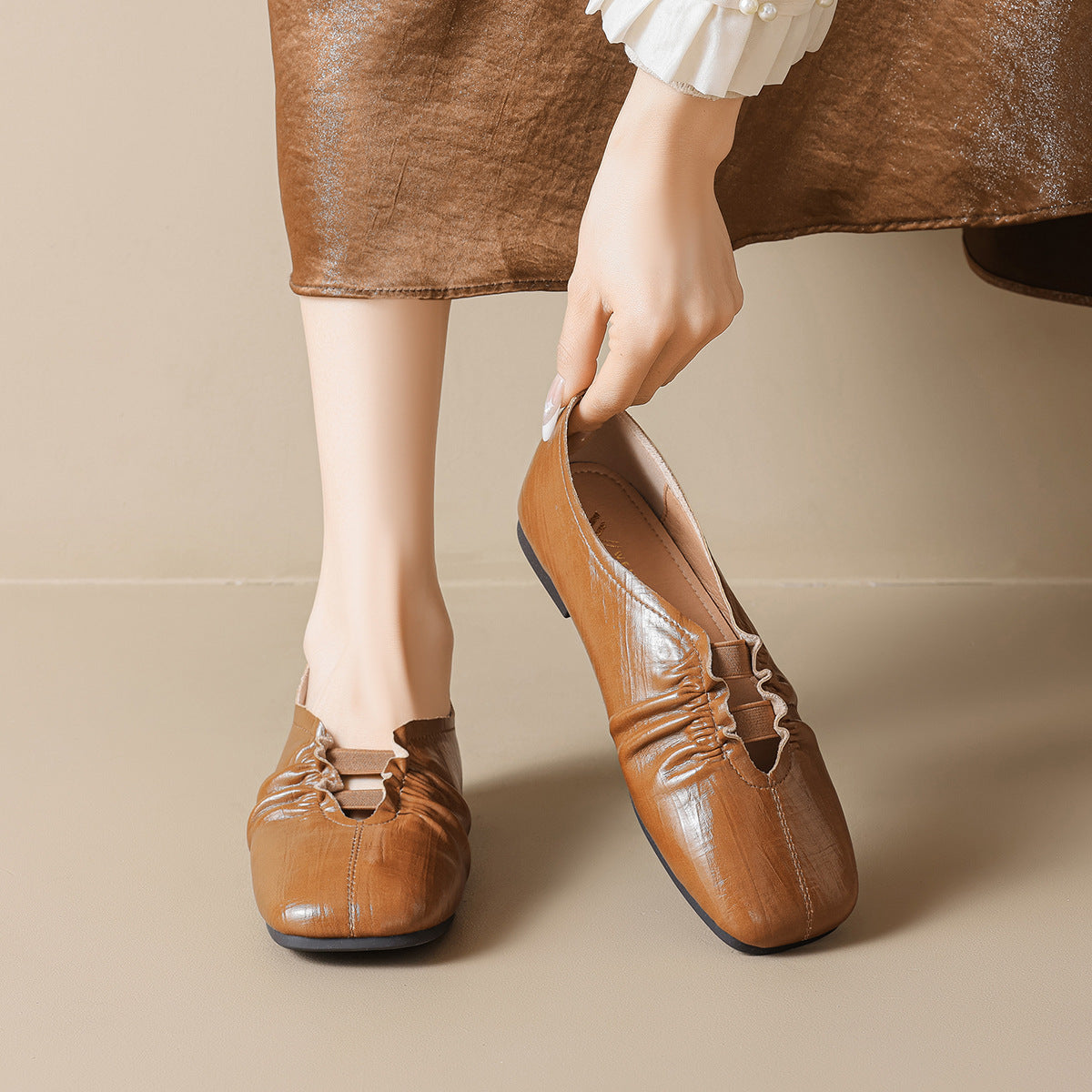 Damen Freizeitliche Slipper mit modischer Faltenoptik