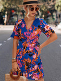 Damen Wickelkleid mit floralen Akzenten und elegantem Taillengurt R&B