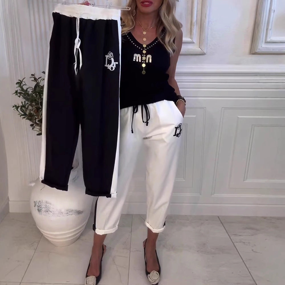 Damen nan Cropped-Jogginghose mit kontrastierendem Bund, seitlichem Zierstreifen, Kordelzug und Logostickerei R&B