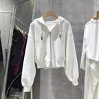 Damen cropped Kapuzenjacke mit lässigem Schnitt und elastischen Bündchen