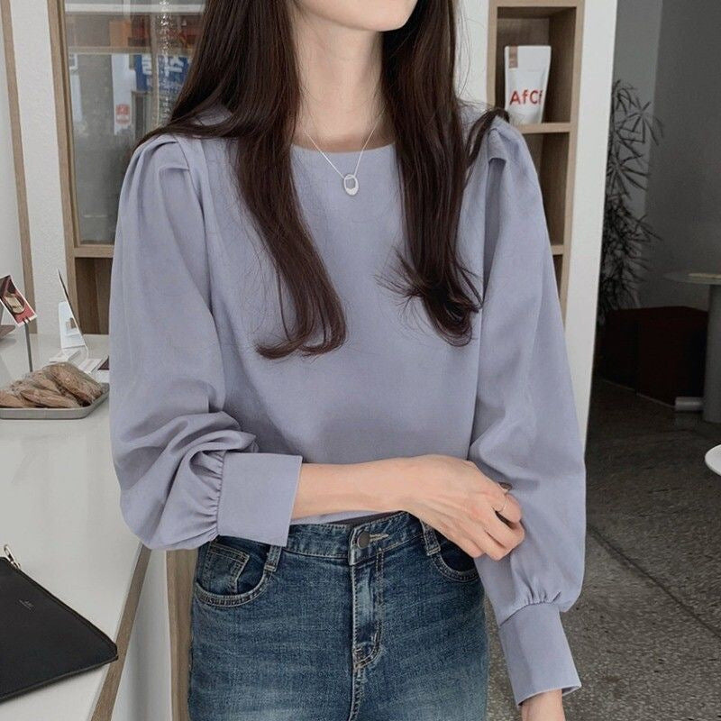 Damen Bluse mit Puffärmeln und vielseitigem Schnitt