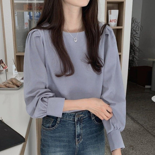 Damen Bluse mit Puffärmeln und vielseitigem Schnitt