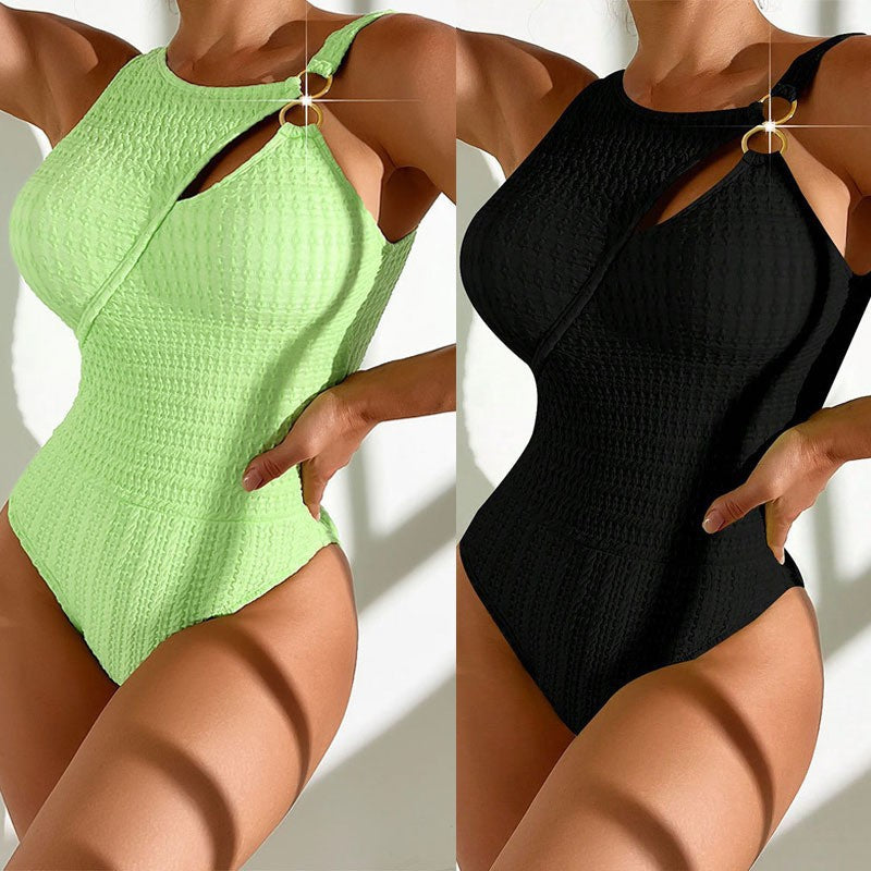 Damen Einteiliger Badeanzug mit kunstvollem Cut-Out und goldenen Akzenten
