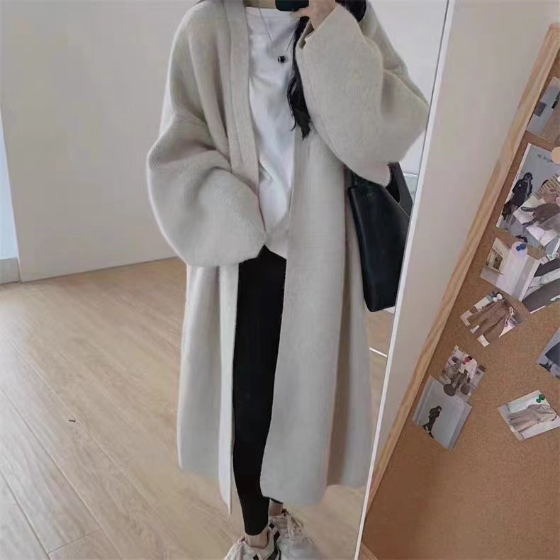 Damen Langer Wollmantel im minimalistischen Stil mit weitem Schnitt und eleganten Details R&B