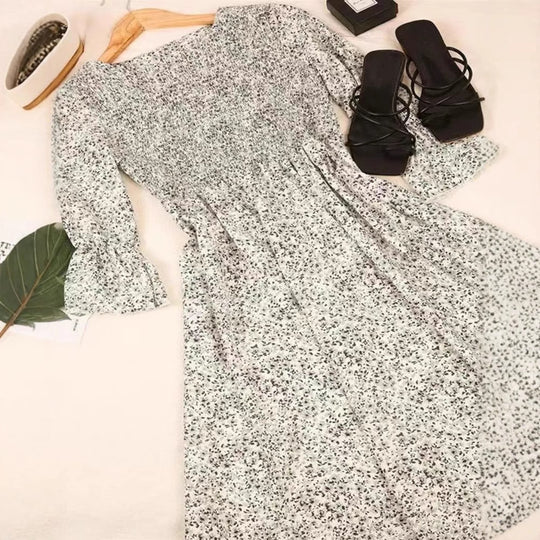 Damen Kleid mit floralen Akzenten und luftigen Puffärmeln Heidi-Mode