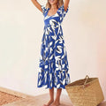 Damen Maxi-Kleid mit floralem Design und voluminösem Rock R&B