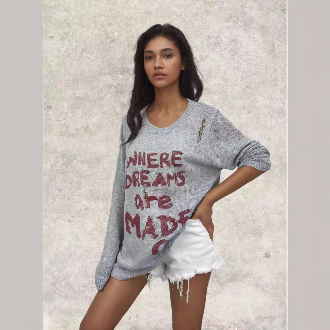 Damen Oversized Pullover mit kreativen Schriftzügen und raffinierten Details