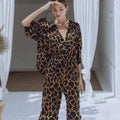 Damen Jumpsuit mit weit geschnittenen Beinen und elegantem Giraffenmuster R&B