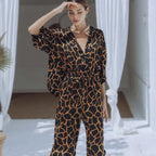 Damen Jumpsuit mit weit geschnittenen Beinen und elegantem Giraffenmuster R&B