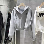 Damen cropped Kapuzenjacke mit lässigem Schnitt und elastischen Bündchen