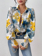 Damen Bluse mit floralen Mustern und puffärmel