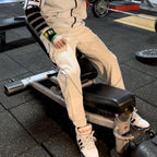 Damen Sportliche Jogginghose mit Druckknopfdetails R&B