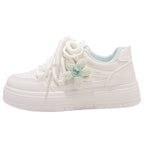 Damen Sneakers mit floralem Anhänger und komfortabler Sohle