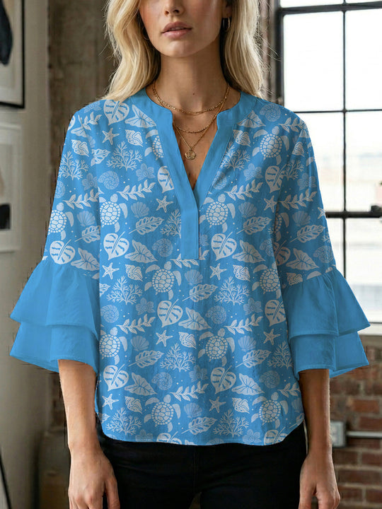 Damen Bluse mit voluminösen Rüschenärmeln und modernem Motiv R&B