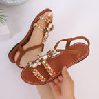 Damen Riemensandalen mit modischen Ornamenten und geflochtenen Details R&B