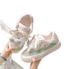 Damen Sneakers mit verspieltem Design und dekorativen Schleifen