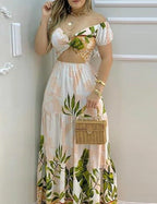 Damen Maxikleid mit floralem Cut-Out Design und Puffärmeln R&B