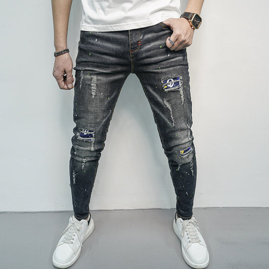 Herren Skinny Fit Jeans im kreativen Rissdesign und bunten Farbsklecks R&B