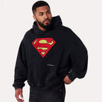 Herren nan weit geschnittener Kapuzenpullover mit markantem Comic‑S‑Logo Kängurutasche und gewaschener Look R&B