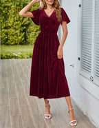 Damen Midikleid mit V-Ausschnitt und voluminösen Ärmeln