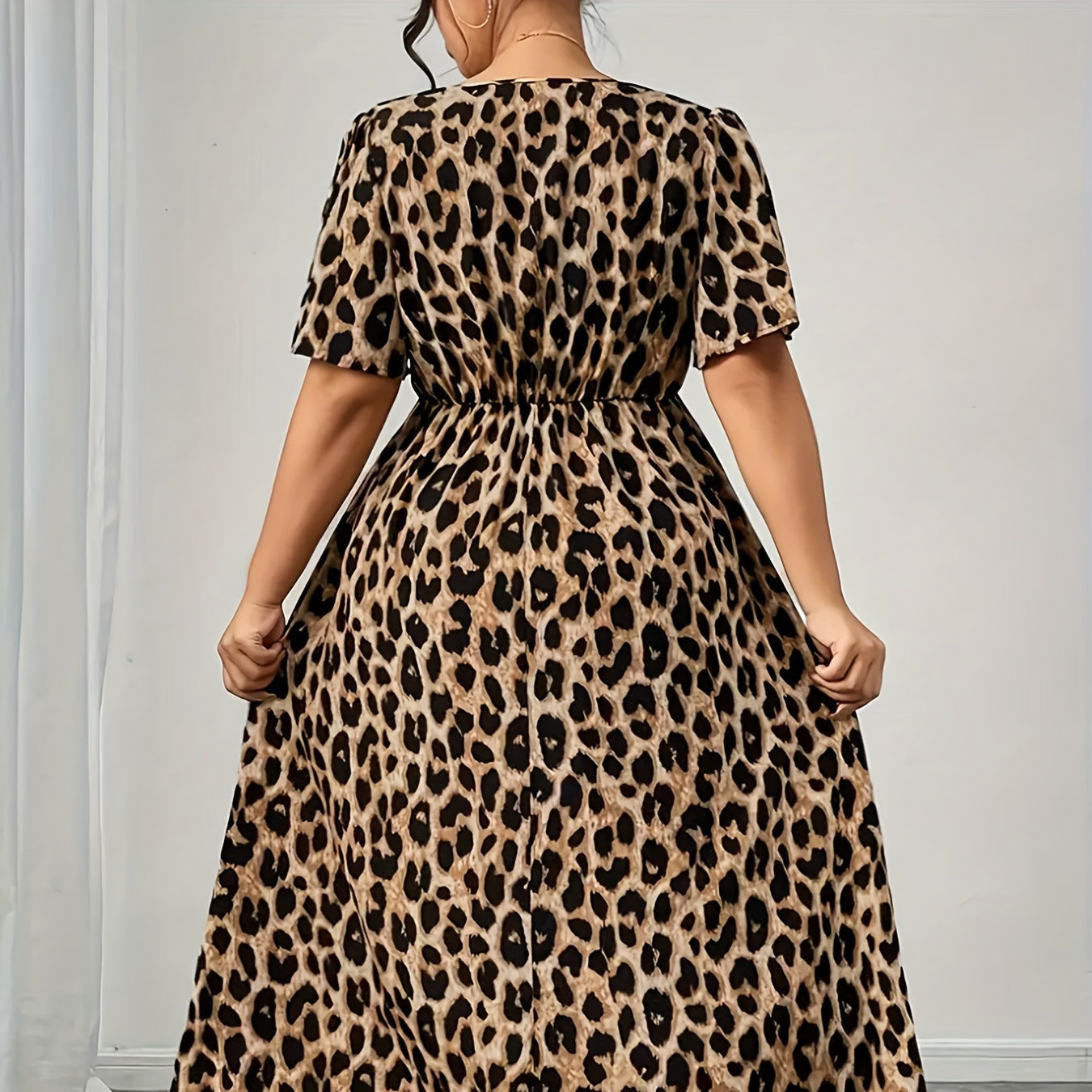 Damen Maxikleid mit raffiniertem Knotendesign und modernem Tiermuster R&B