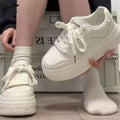 Damen Sneaker mit hochgezogener Plateausohle und atmungsaktiver Oberflächenstruktur R&B