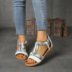 Damen Offene Sandalen mit geflochtenem Riemendesign und elegantem floralem Detail R&B
