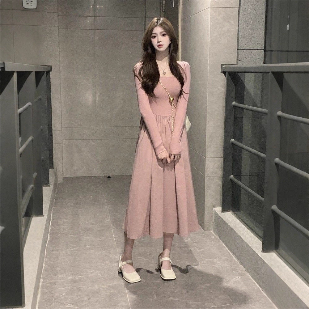 Damen langärmliges Midi-Kleid mit schwingendem Rock und dekorativen Puffärmeln