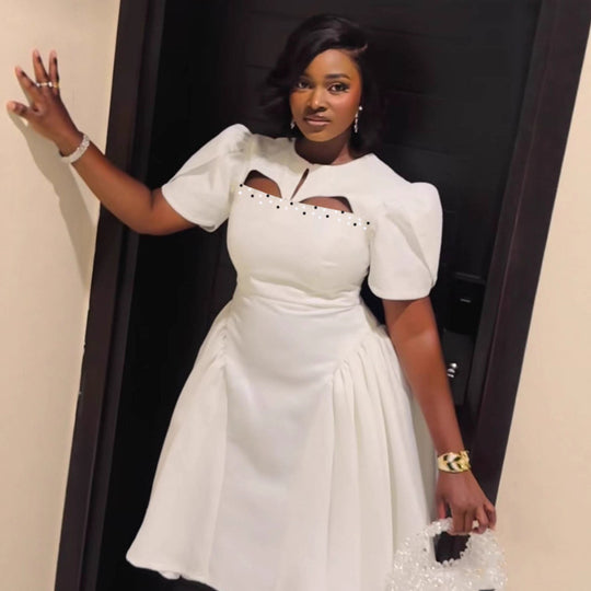 Damen Kleid mit eleganten Puffärmeln und raffinierten Cut-Outs R&B