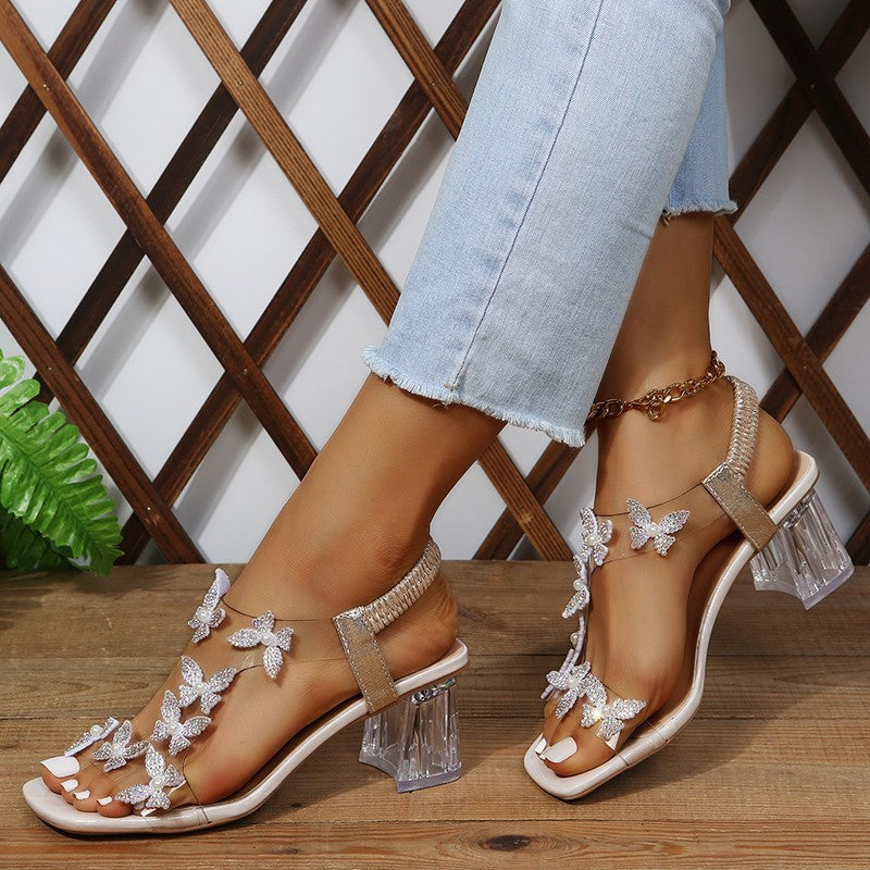 Damen Glamouröse Sandalen mit funkelnden Schmetterlingsdetails und transparentem Blockabsatz R&B