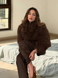 Damen Luxuriöse Felljacke mit voluminösen Ärmeln und elegantem Schnitt