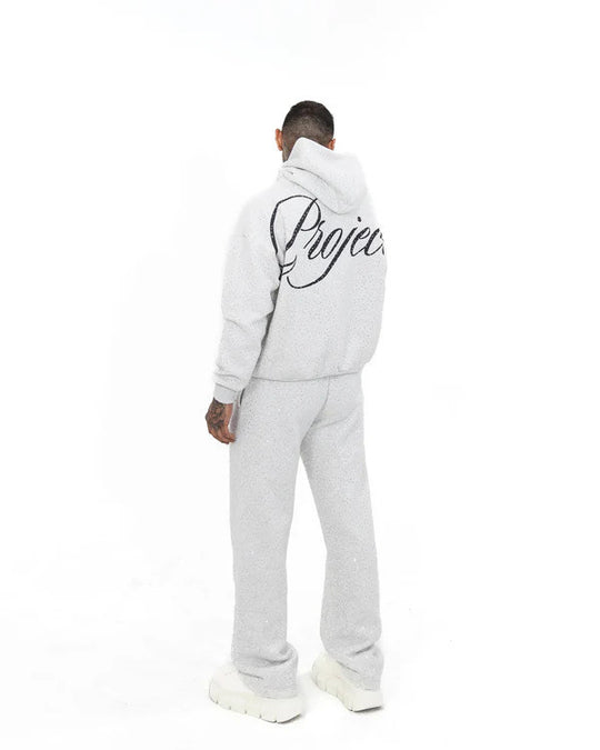 Herren nan weite Komforthose mit geradem Bein, elastischem Kordelbund, dezenter Schriftzug-Stickerei und feiner Sprenkeloptik R&B