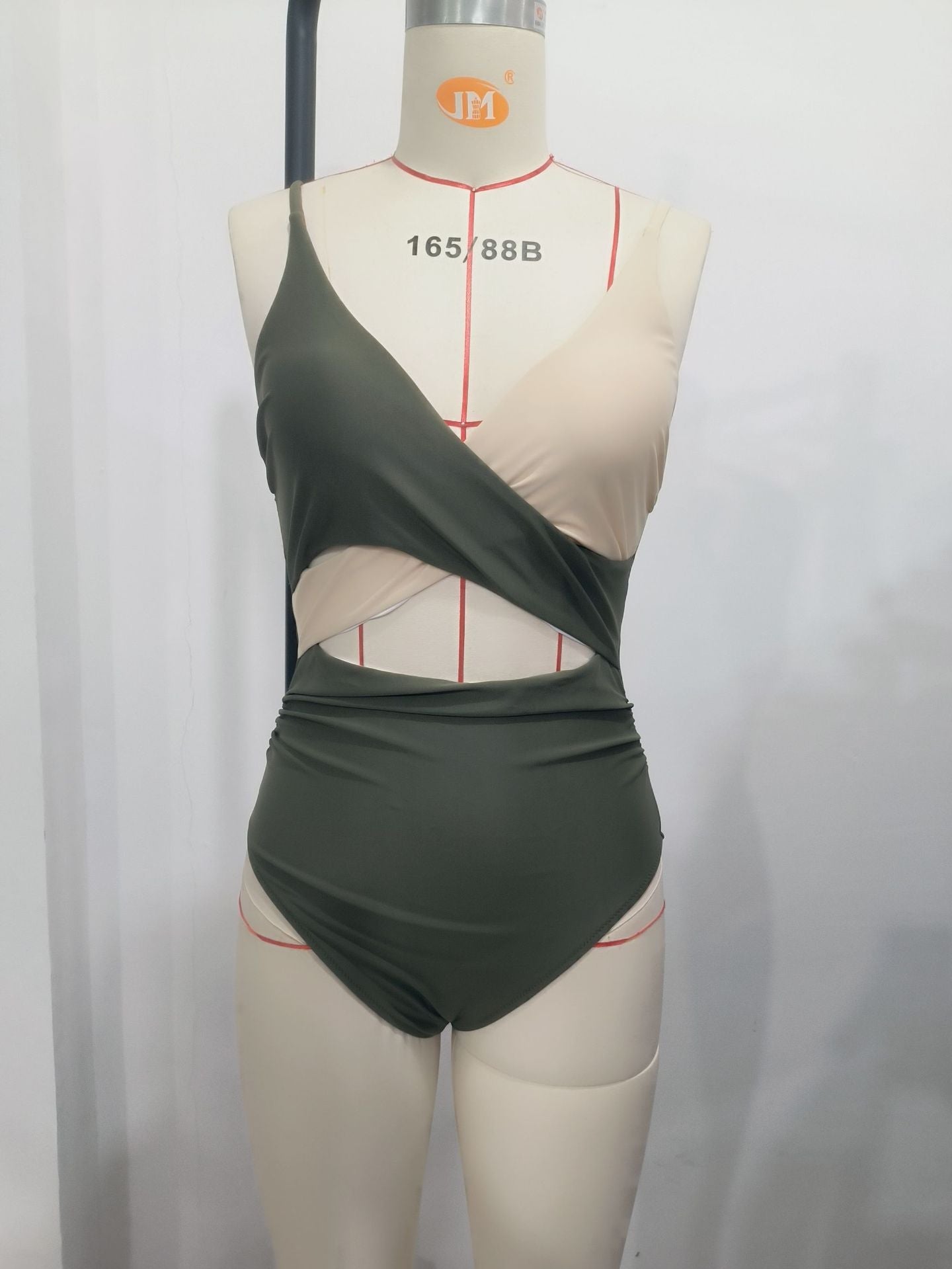 Damen Modern gestalteter Einteiler-Badeanzug mit asymmetrischem Schnitt und Wickeldetails R&B