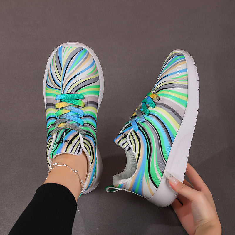 Damen Sportliche Sneakers mit buntem Wellenmuster