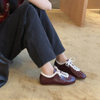 Damen Sneaker im modernen Glanz-Look mit atmungsaktiver Machart