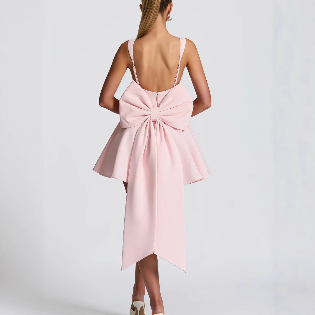 Damen Cocktailkleid mit oversized Schleifen-Design und fließendem Rock EB