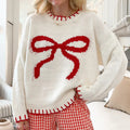 Damen Grob gestrickter Pullover mit dekorativem Schleifenmuster und kontrastierenden Abschlüssen