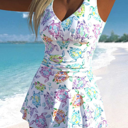 Damen Schwimmdress mit fröhlichem Schildkrötenmotiv und elegantem Rocksaum R&B