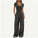 Damen Eleganter Wickel-Jumpsuit mit weitem Bein und modischen Details EB
