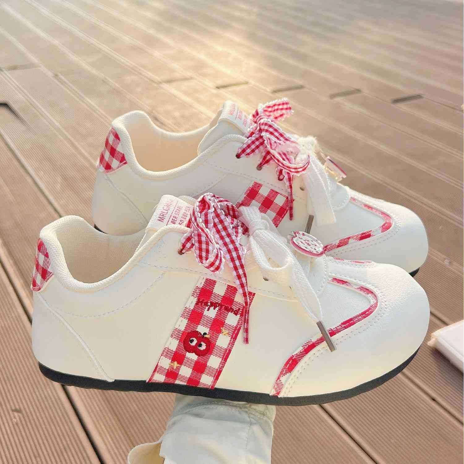 Damen Sneakers mit verspieltem Karomuster und dekorativen Schleifen
