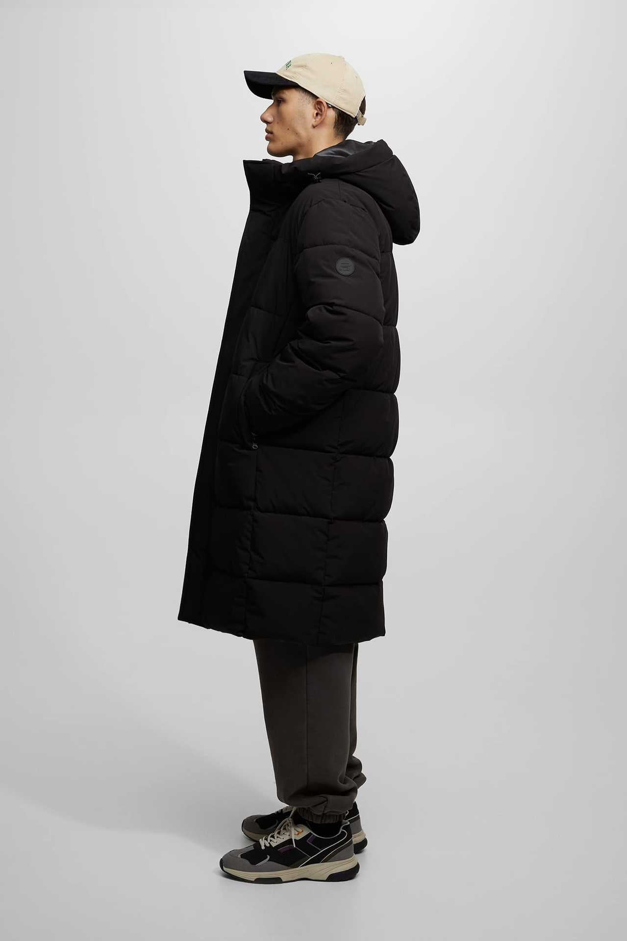 Damen gesteppte Wintermantel mit Kapuze und praktischen Taschen Hedi-Mode