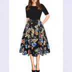 Damen Midikleid mit floralem Muster und gestreiften Akzenten