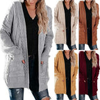 Damen Grobstrickjacke mit femininer Silhouette und praktischen Taschen