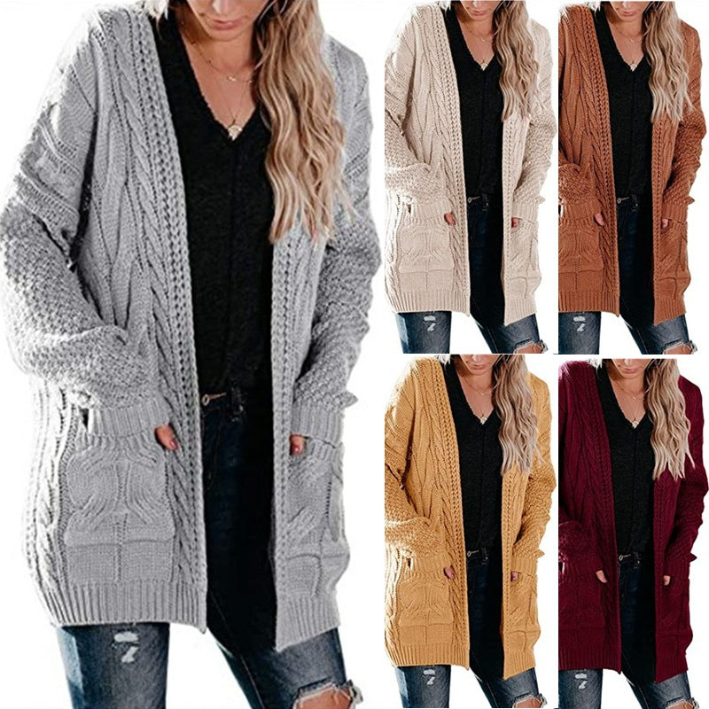 Damen Grobstrickjacke mit femininer Silhouette und praktischen Taschen