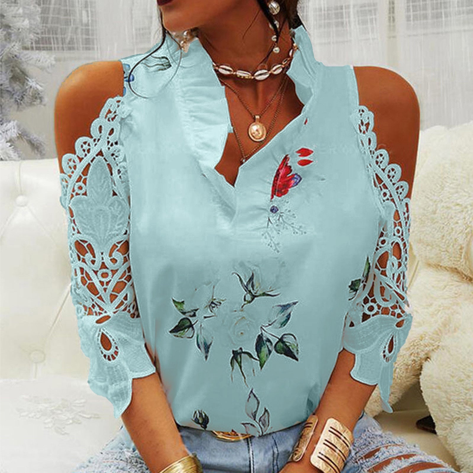 Damen Bluse mit Cut-Out-Ärmeln und floralem Design