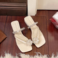 Damen elegante Slipper mit floralen Applikationen und Schmuckdetails EB